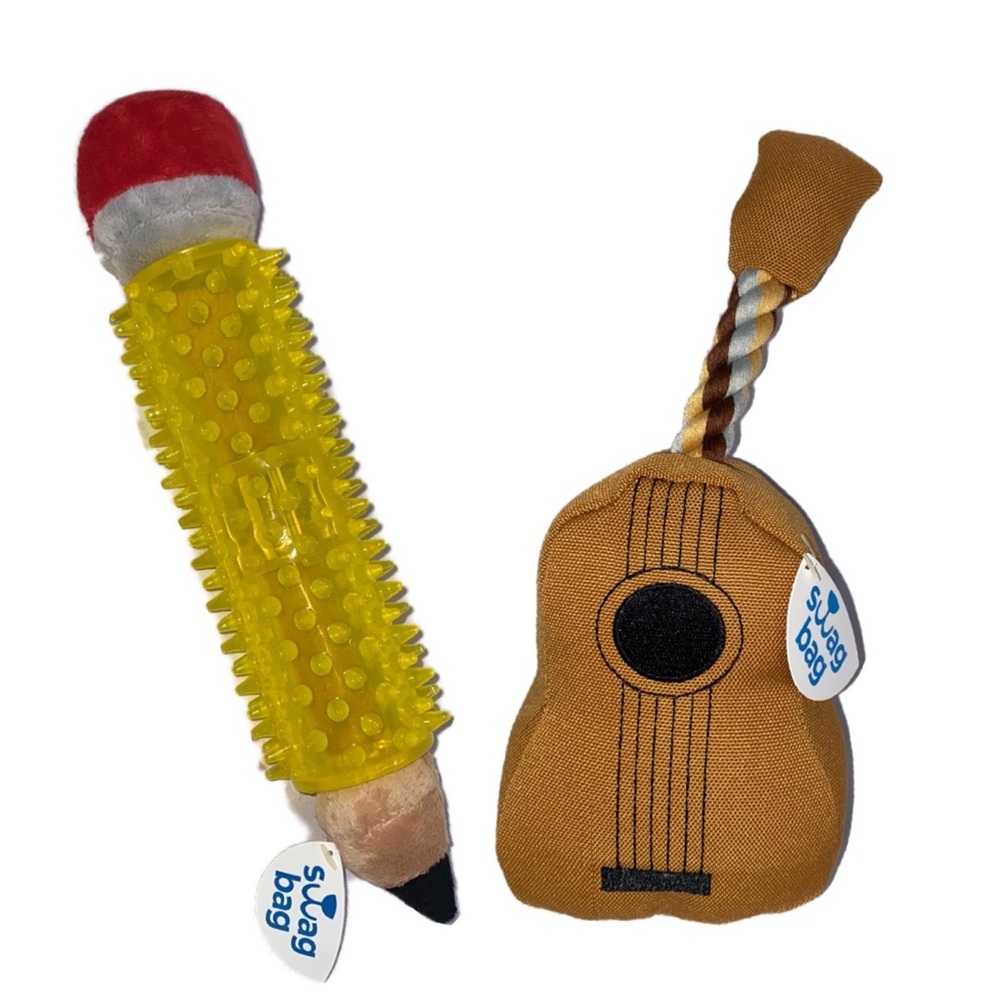 2 pack NWT dog toys. Puppy pencil and squeaker music maker!
